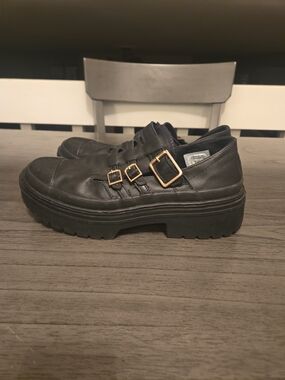 Converse Black Leather Platform Buckle Shoes with Gold Hardware